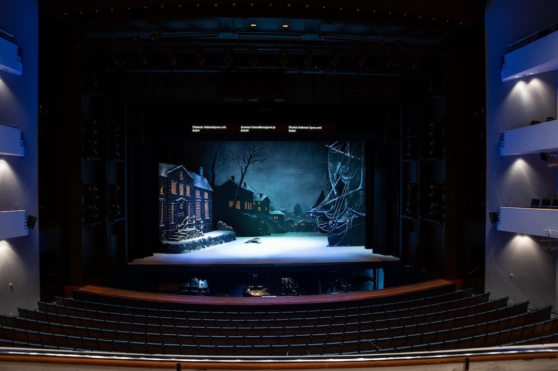 1st balcony, 2nd row, seat 100
